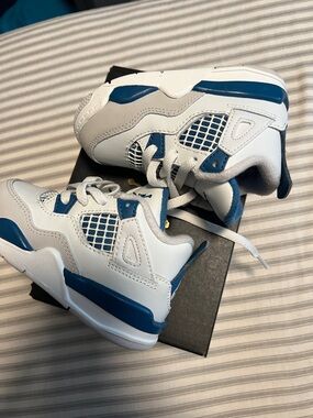 Jordan 4 Retro Kids White and Blue Low Top Sneakers